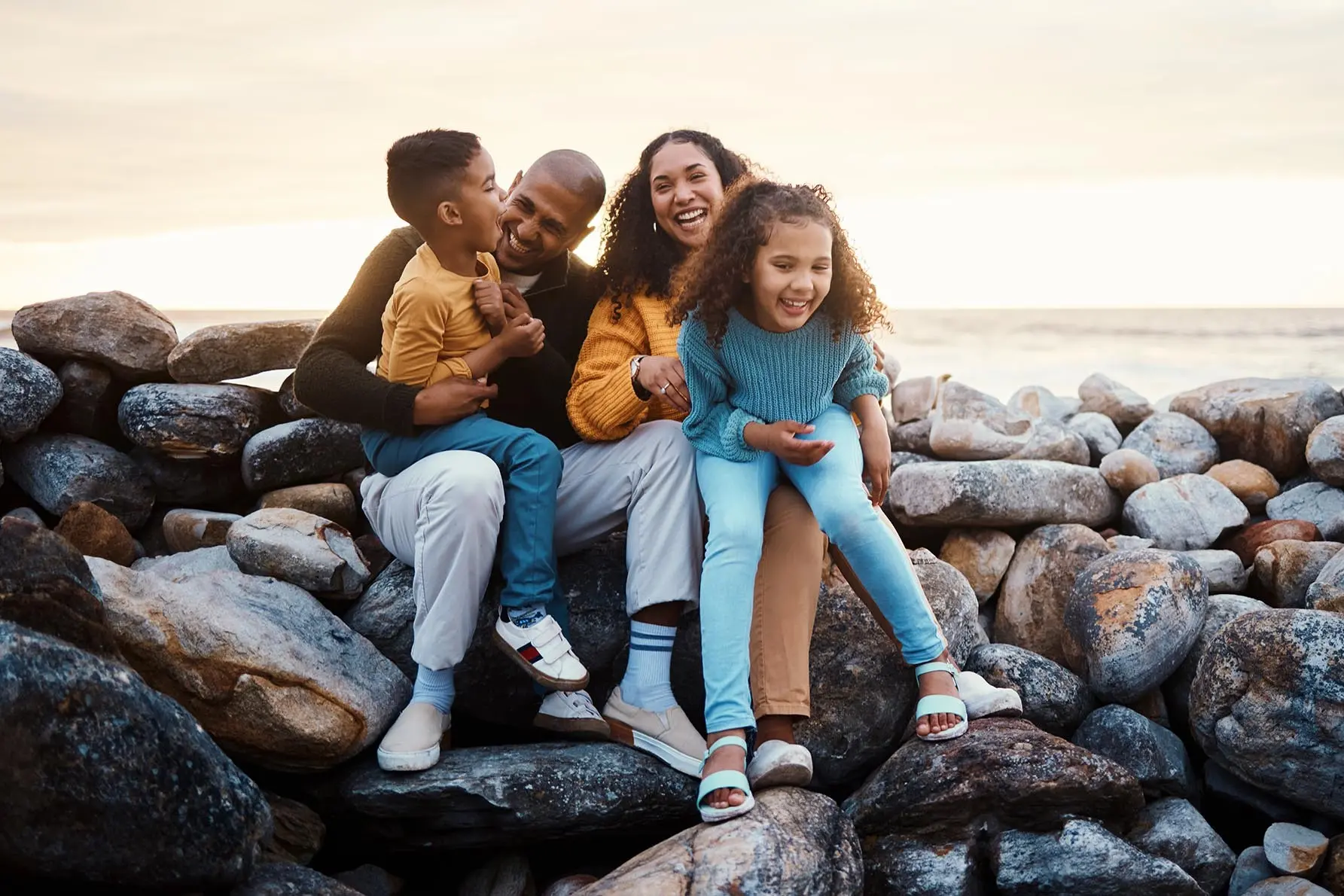 A family on the beach, reflecting the benefits of a Tax Free Savings Account